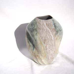 12. Capsule VI